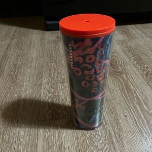 Starbucks tumbler.